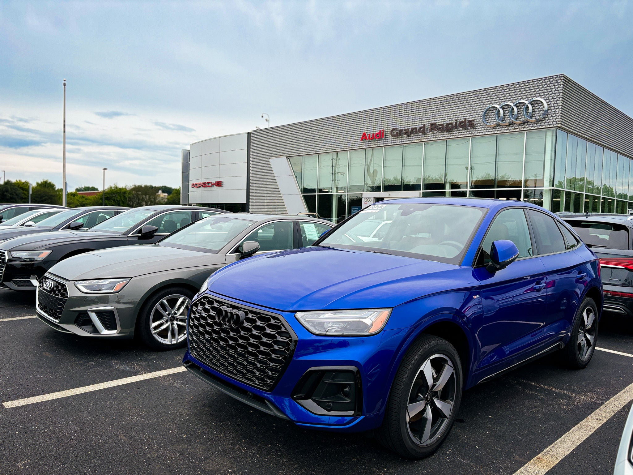 Audi vehicles parked at Audi Grand Rapids.